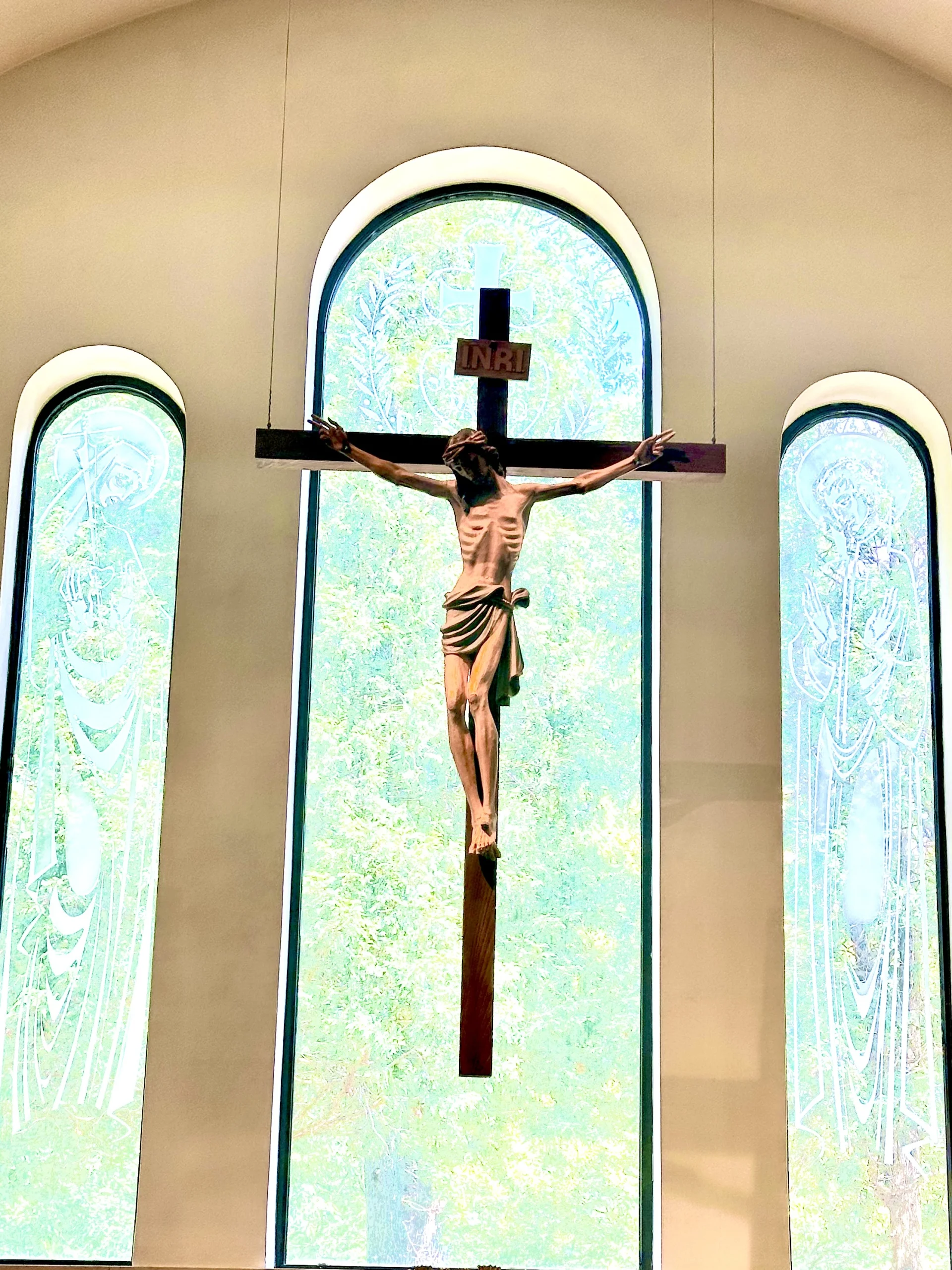 interior windows with a crucifix