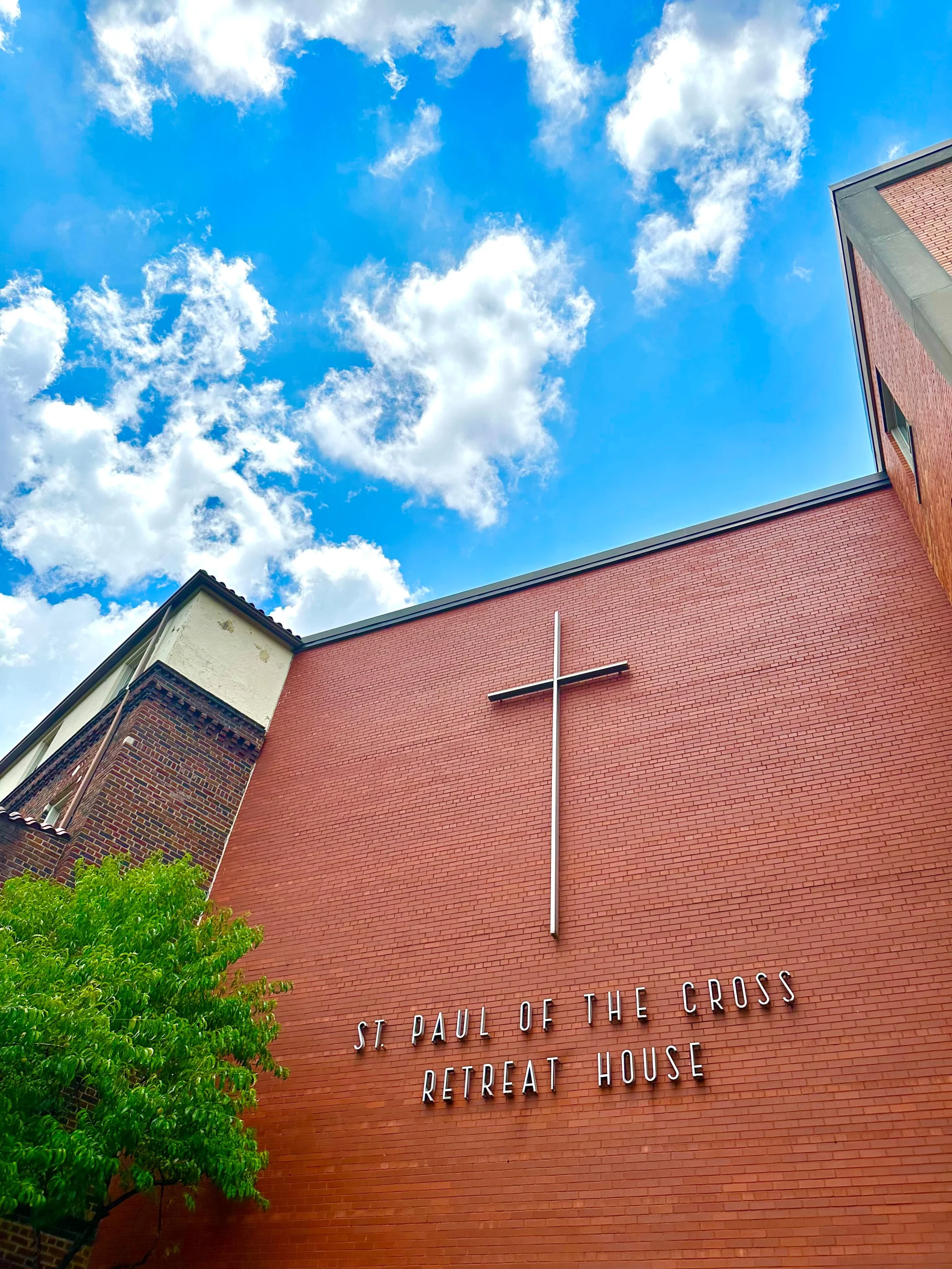 St. Paul of the Cross building sign and cross